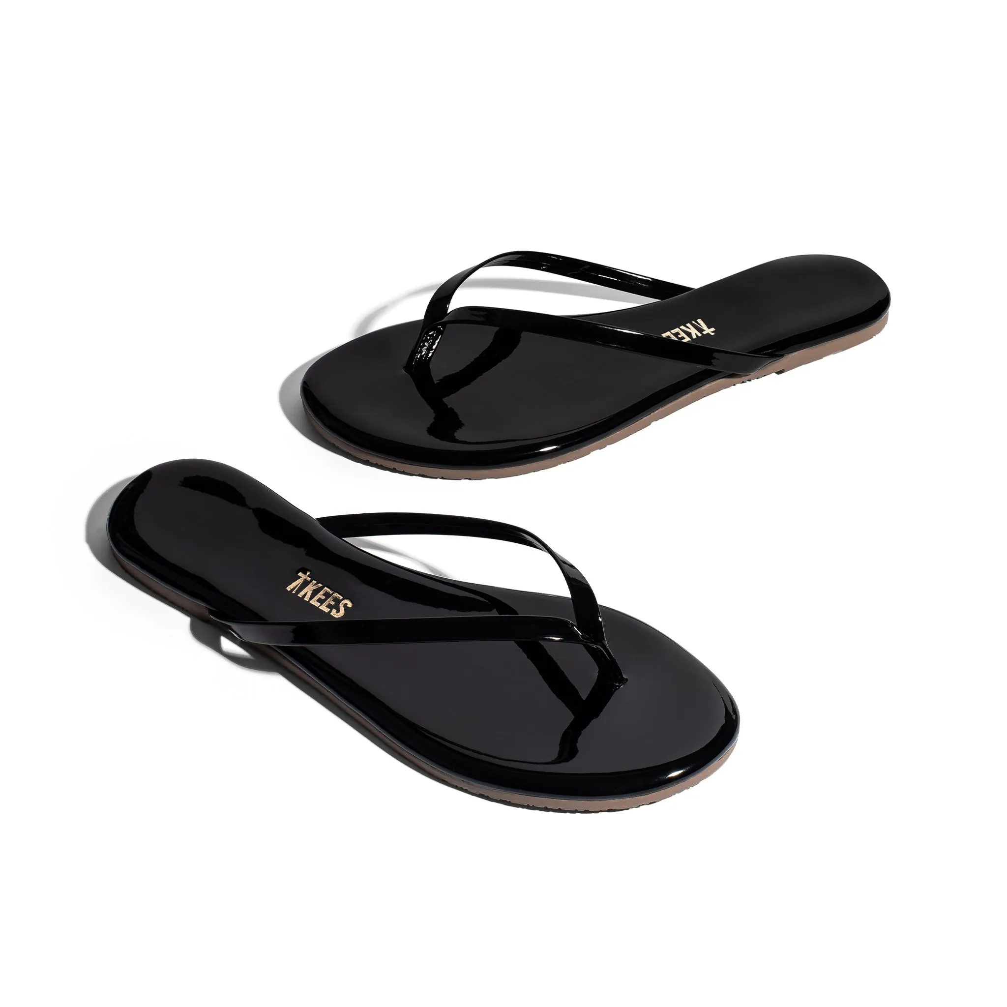 Tkees Lily glosses flip-flops from brazilian leather in Licorice